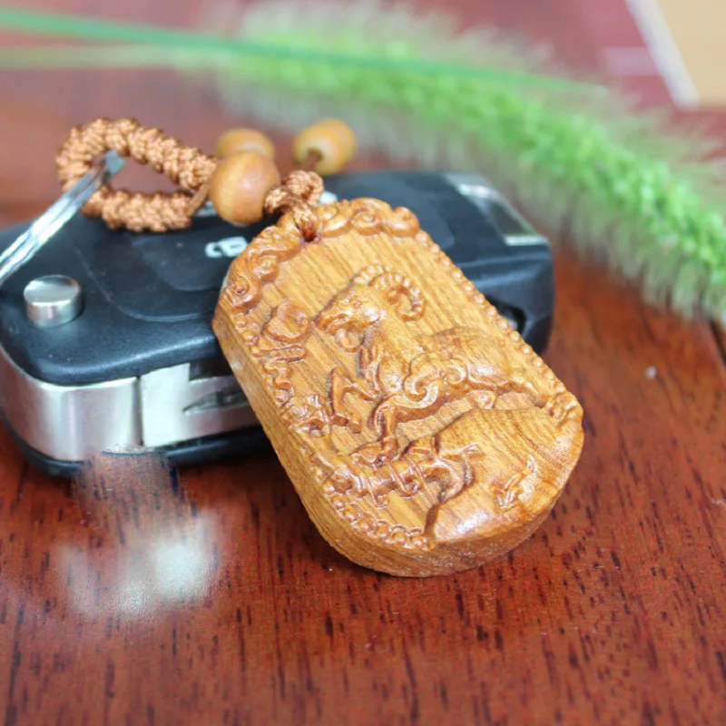 Оптовая продажа Высококачественная палисандр резная овечка брелок с