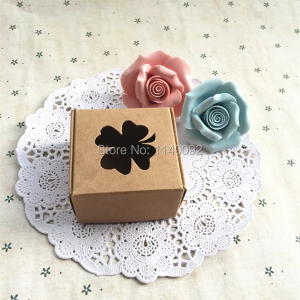 

Free shipping 5.8x5.8x3.2cm kraft paper packing box/lovely jewelry case with openings/cute candy box/50pcs a lot