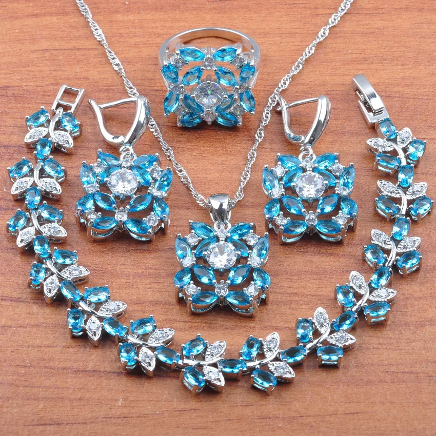 Комплект из колье серёг кольца и браслета с голубым цирконием | Украшения