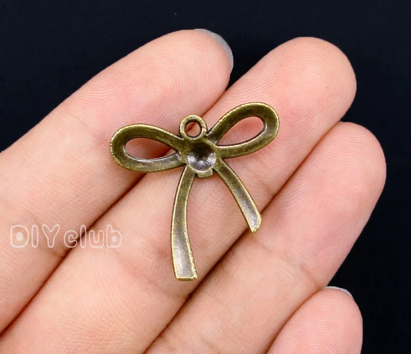 

60pcs- Antique Bronze Plated Bow Charms Pendant 25x24mm