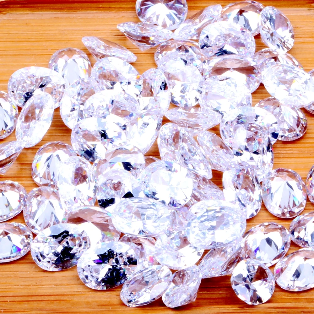 Овальная форма много размеров блестящий кристально чистый цвет кубический