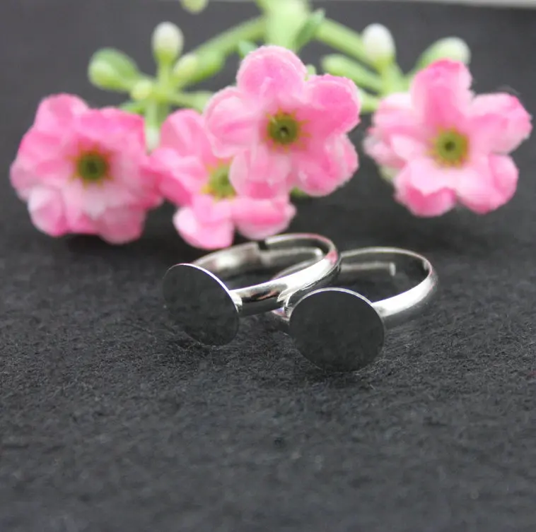 

250pcs of silver tone lead and nickle free Adjustable Rings with Glue Pad 10 mm ,adult size free shipping