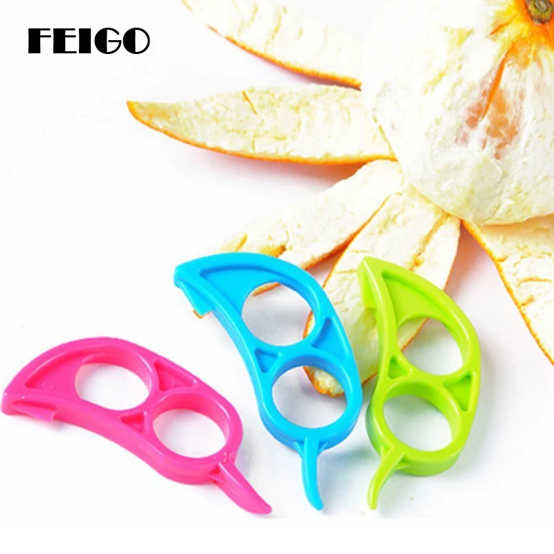 

FEIGO New Creative Lemon Orange Peel Tools 2 Pcs Plastic Fruit Kitchen Peeling Small Tools Fruit Lemon Oranges Fruit Tools F653