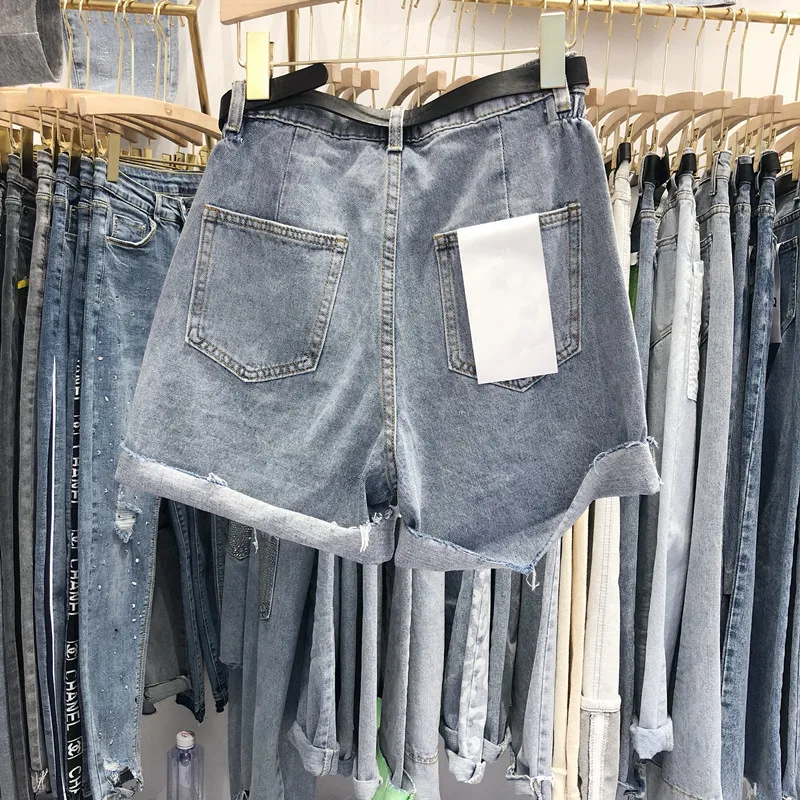 

2019 spring new women's wild street pockets broken edge hot drilling denim shorts H106