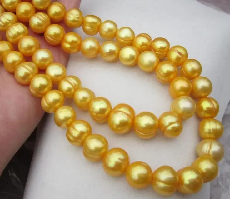 

35" 11-12 MM NATURAL YELLOW SOUTH BAROQUE PEARL NECKLACE YELLOW CLASP