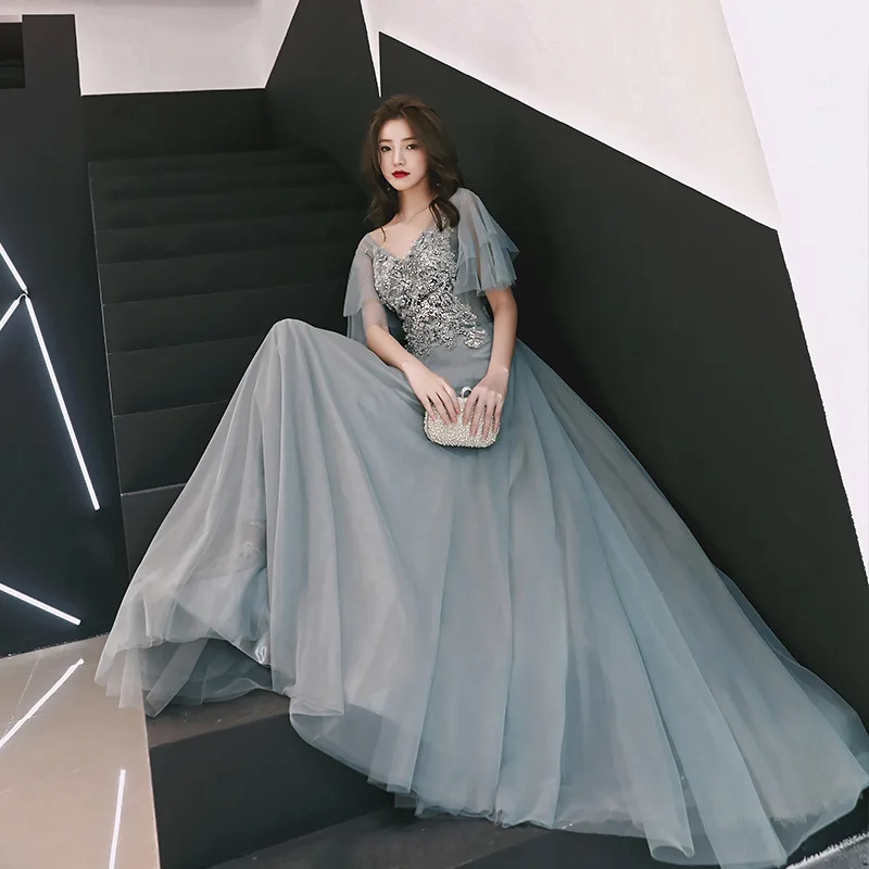 Сексуальное вечернее платье с открытой спиной а силуэта коротким рукавом