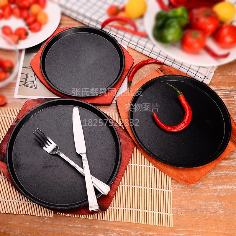 

Sizzling round iron Steak Sizzling Grilled dish Fried meat Grilled iron dish Domestic restaurant with iron plate