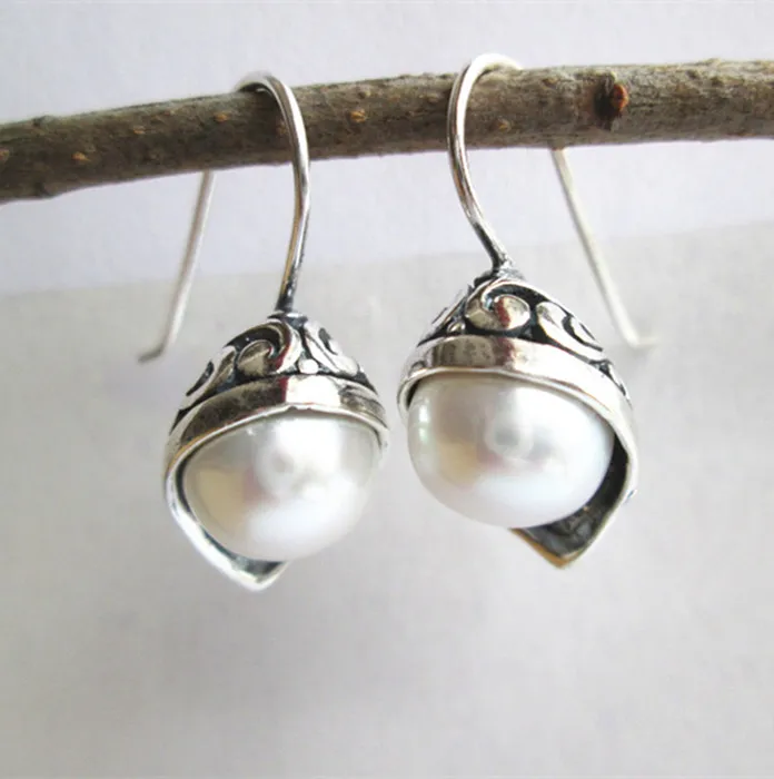 

KJJEAXCMY fine jewelry 925 pure silver inlaid natural pearl style hollowed lady eardrop jewelry lady
