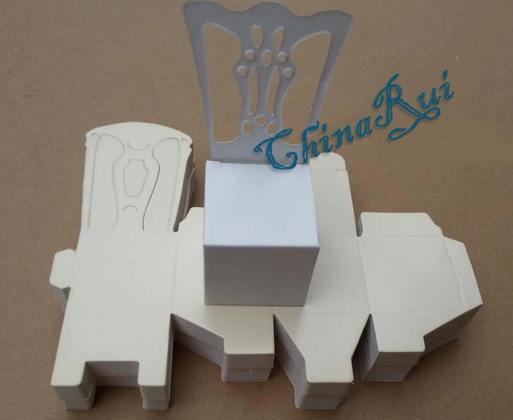 Праздничные принадлежности необычный стул дизайн бумаги шоколадный подарок