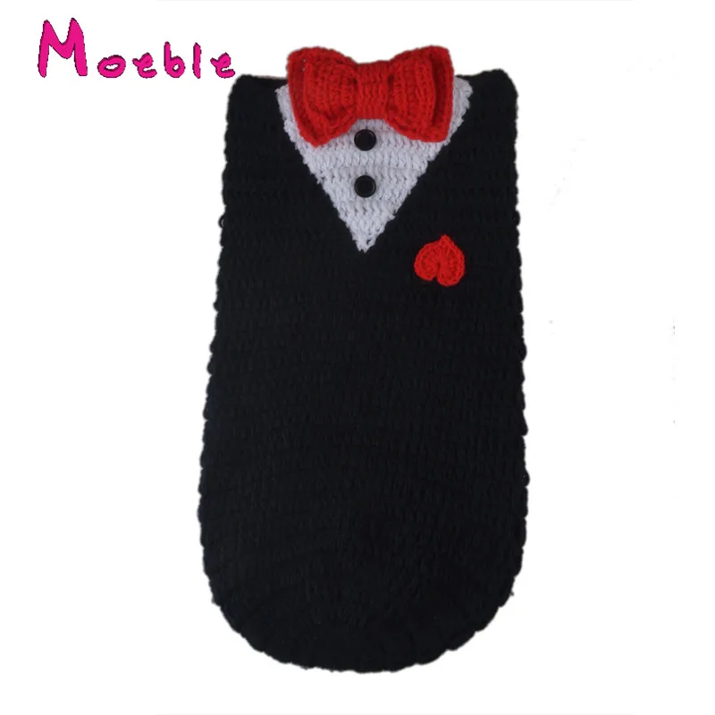 Спальный мешок для новорожденных вязаный кокон с бантом черного цвета спальный