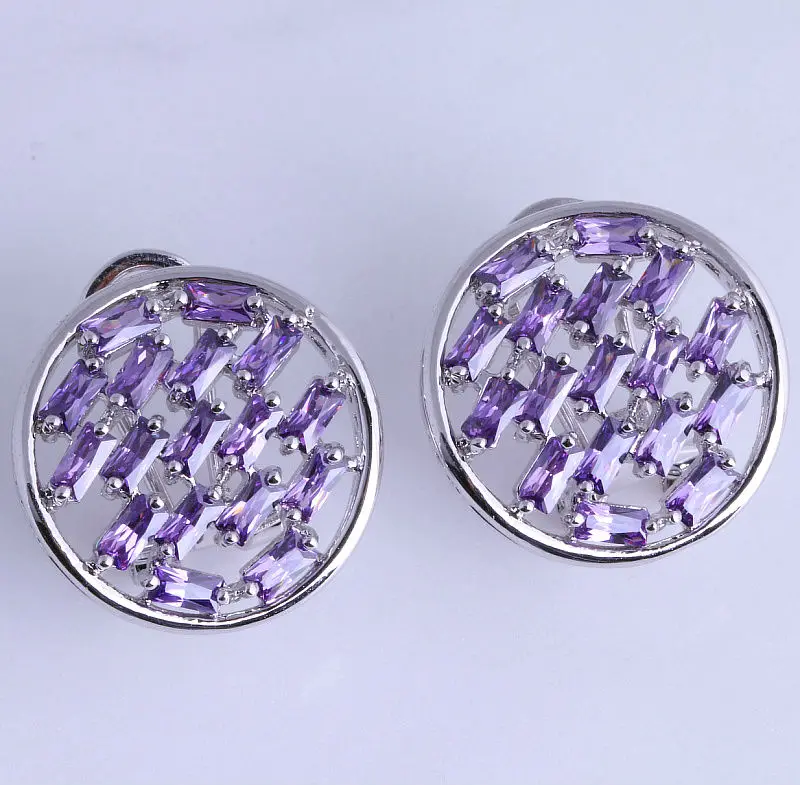Круглые серьги-клипсы серебряного цвета с изысканными фотоэлементами модные