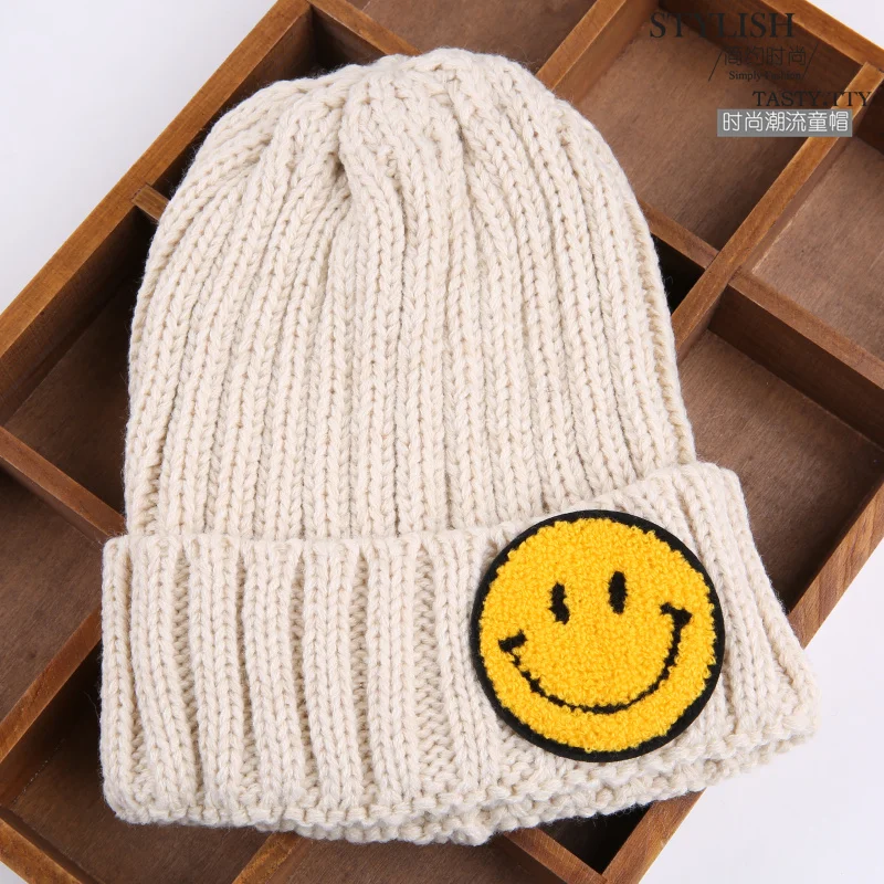 Лидер продаж зимние шапки для мальчиков и девочек однотонные теплые со смайликом