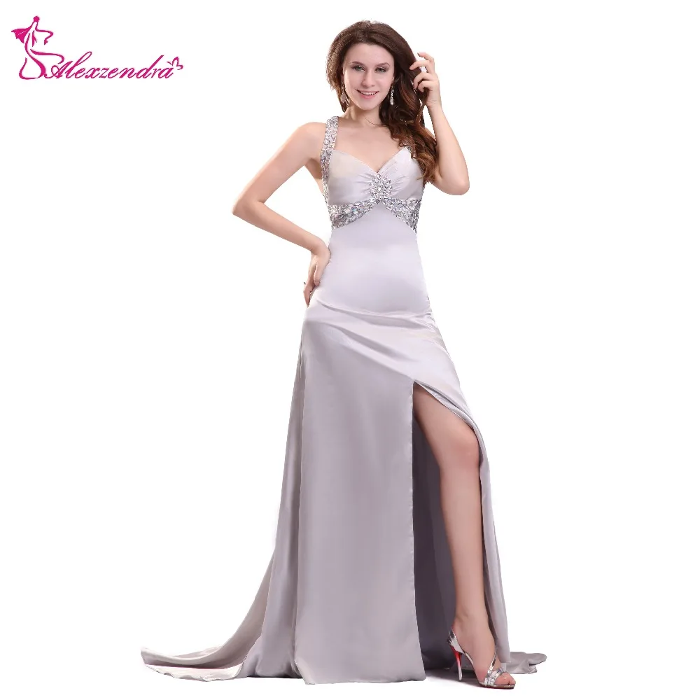 Серебристое вечернее платье с разрезом V образным вырезом и перекрестной