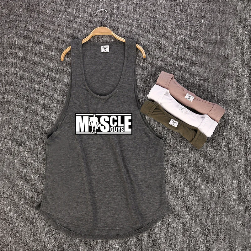 

Muscleguys Brand Bodybuilding Sleeveless Shirt Mens Gyms Tank Top Low Cut Vest Sexy Muscle Fitness Stringer sportwear Undershirt