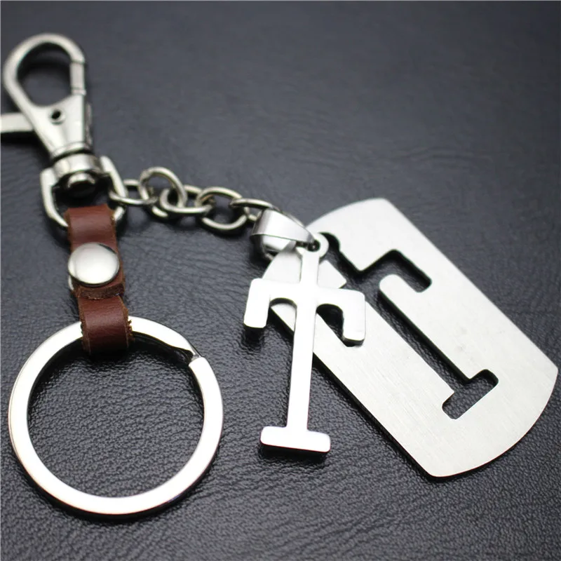 Буквы T отделимые Нержавеющая сталь кулон кожаные брелки Шарм сумка повесить автомобиль брелок 26 букв серии подарок - Цвет: Red Brown
