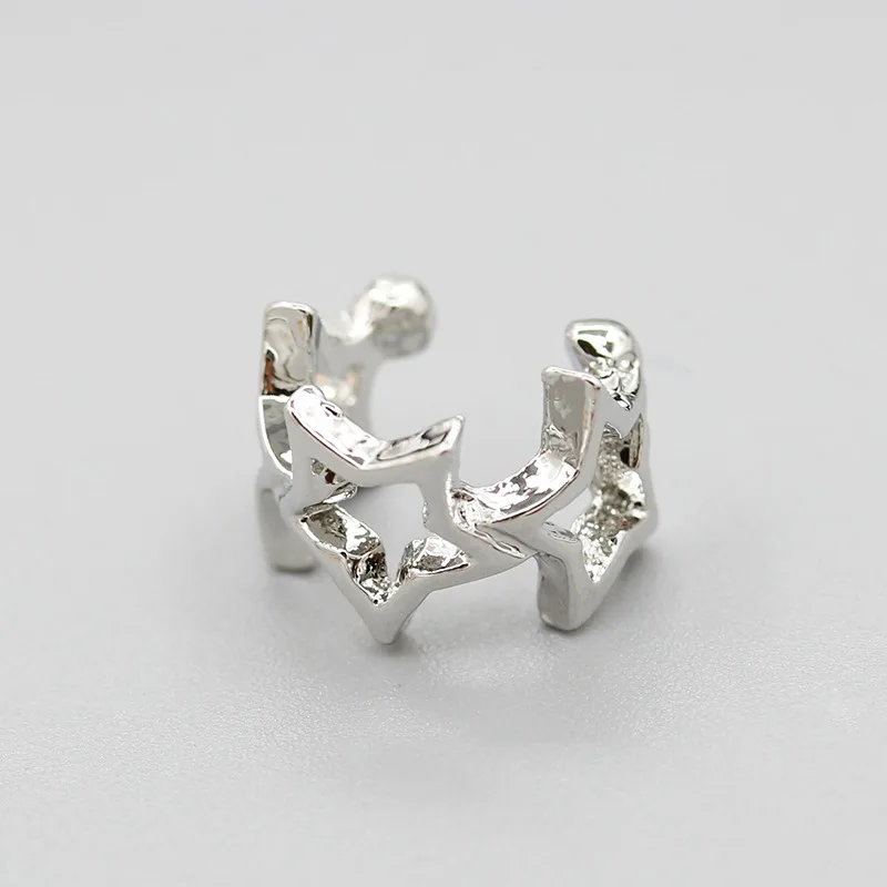 Женские серьги клипсы с тройной полой звездой позолоченные сережки