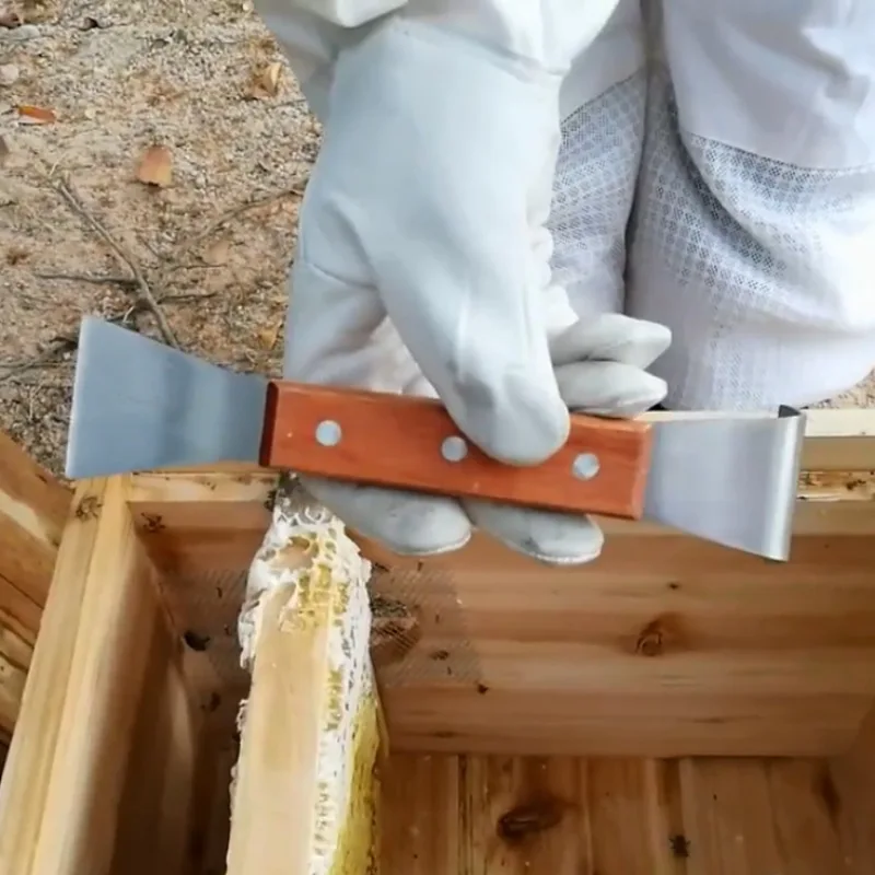 

Multifunctional Stainless Steel Bee Tools Thumb Type Bee Honey Knife Bee Hive Scraper Beekeeping Bee Scraper Cut Honey Knife