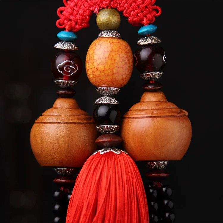 

Hot boutique car accessories Maitreya luxury car hanging accessories smiley mahogany carving car