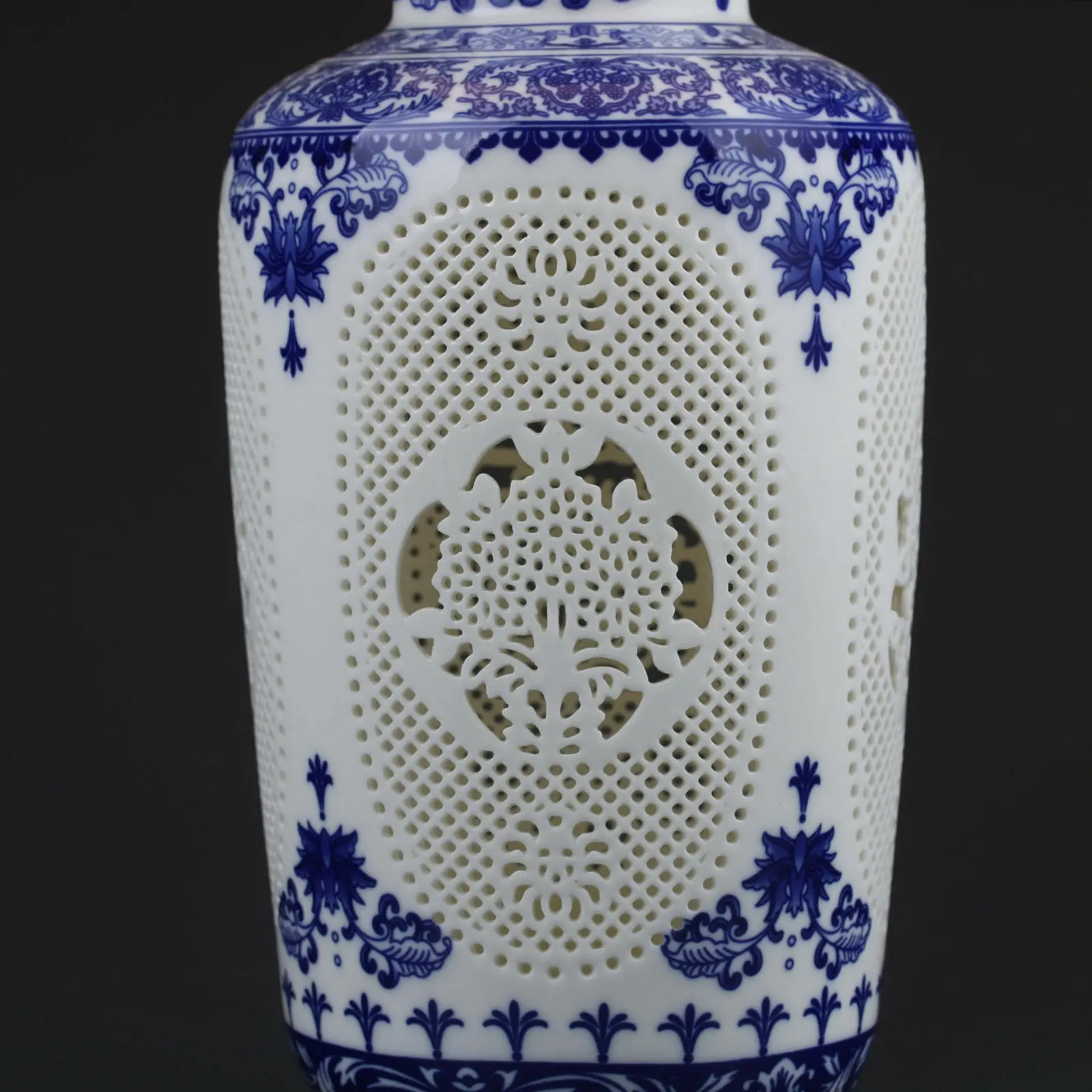 

Chinese White & Blue Porcelain Painted & Hollow Carved Vase W Qianlong Mark
