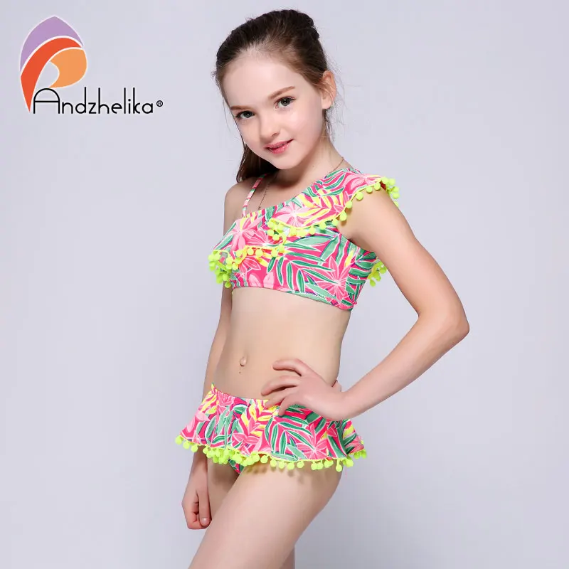 Andzelika bikini бикини для девочки. Раздельный яркий купальник с топом на одно плече с рюшами и плавки с юбкой