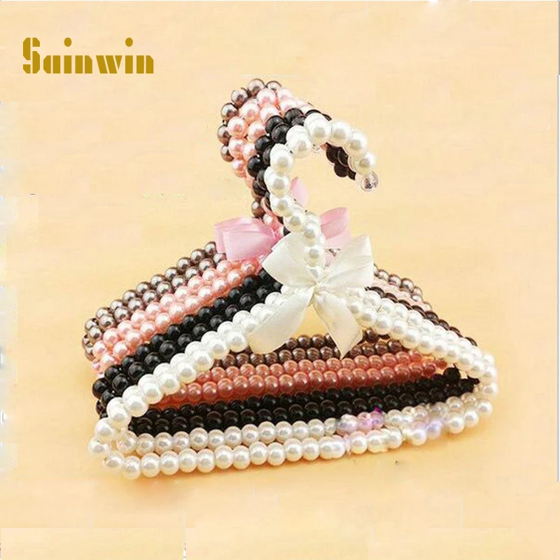 

Sainwin 5 шт./лот 24 см детская жемчужная пластиковая вешалка, детская вешалка для одежды, мини-поводки для домашних животных, одежда высшего каче...