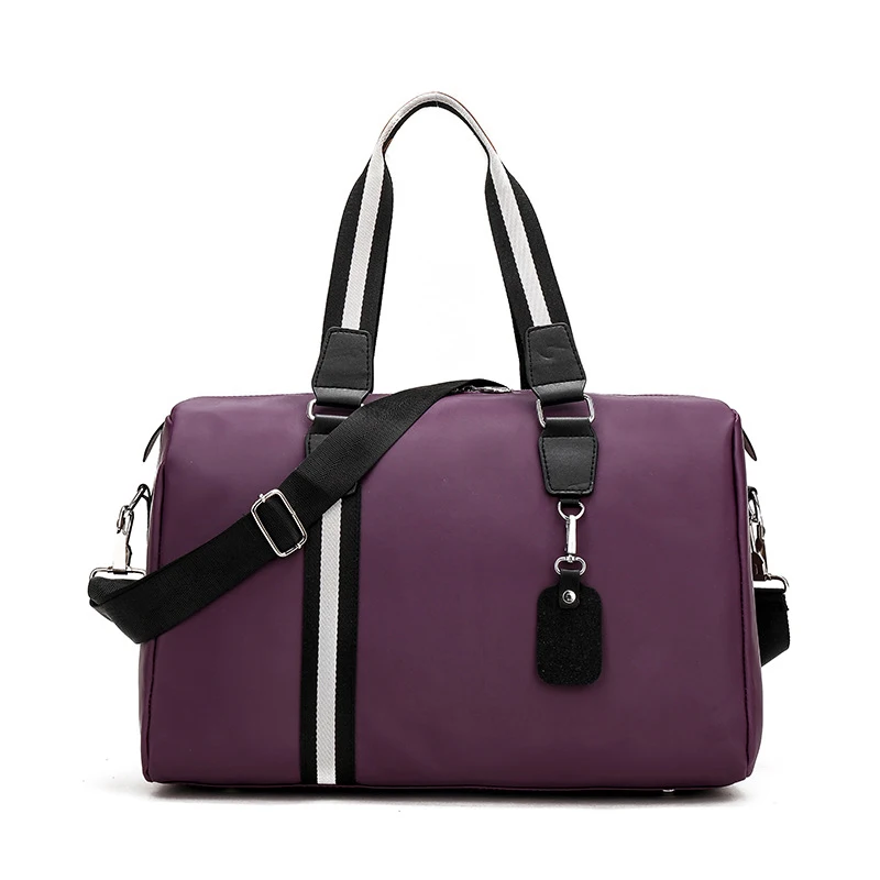 Purple WOBAG Men Travel Bag Large Capacity Women Waterproof Nylon Hand Luggage Bag Multifunction Men Folding Short Distance Weekend Bag - Цвет: Purple