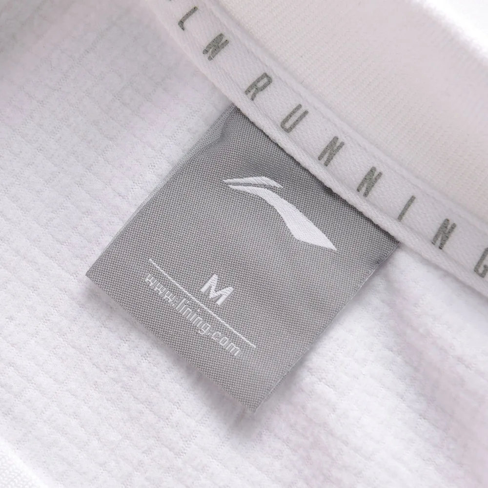 Li Ning Женский трикотажный топ с длинным рукавом 100% полиэстер свободный крой