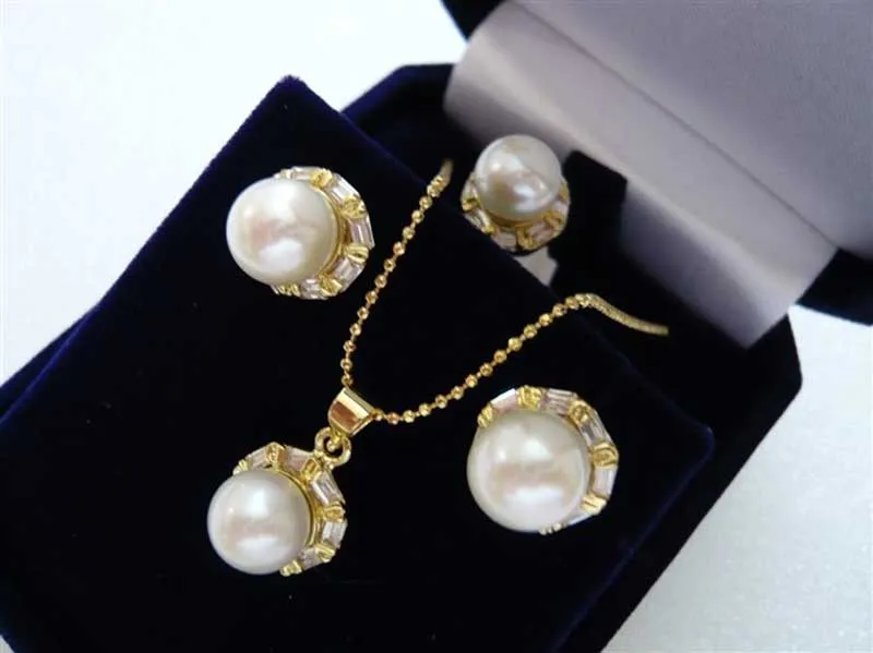 

Wholesale latest fashion white shell pearl nice design earrings pendant necklace & ring(#7.8.9) jewelry set