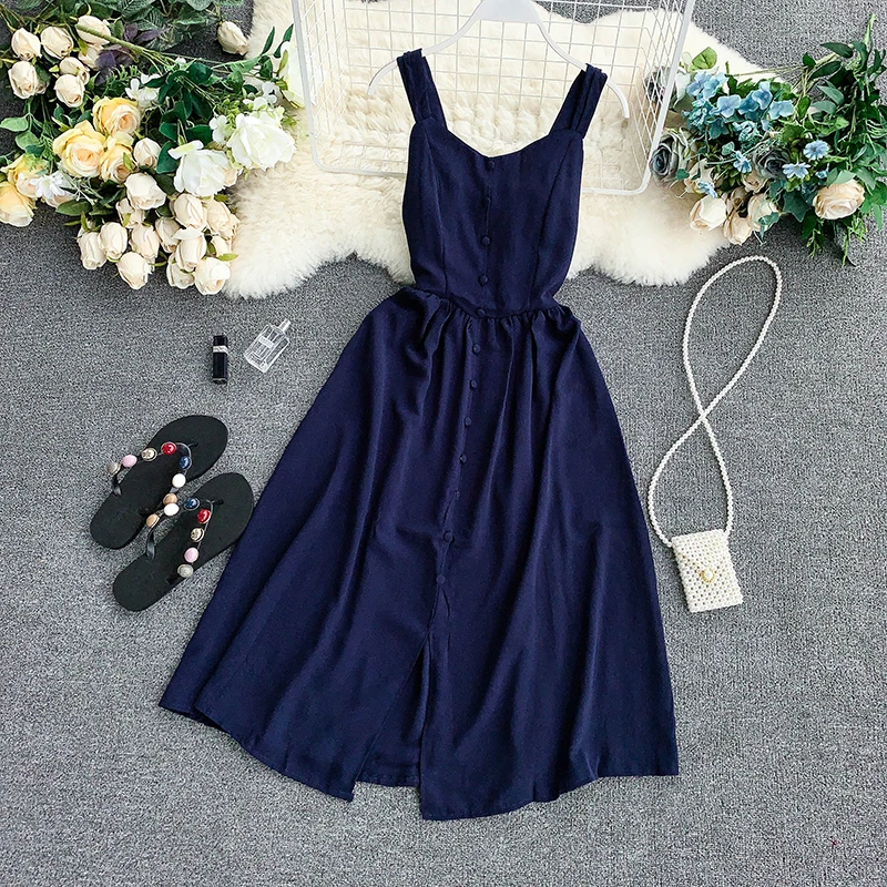 Женское платье на бретельках однобортное без рукавов с V образным вырезом и