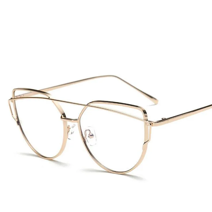 Очки в многоугольной металлической оправе из розового золота с прозрачными