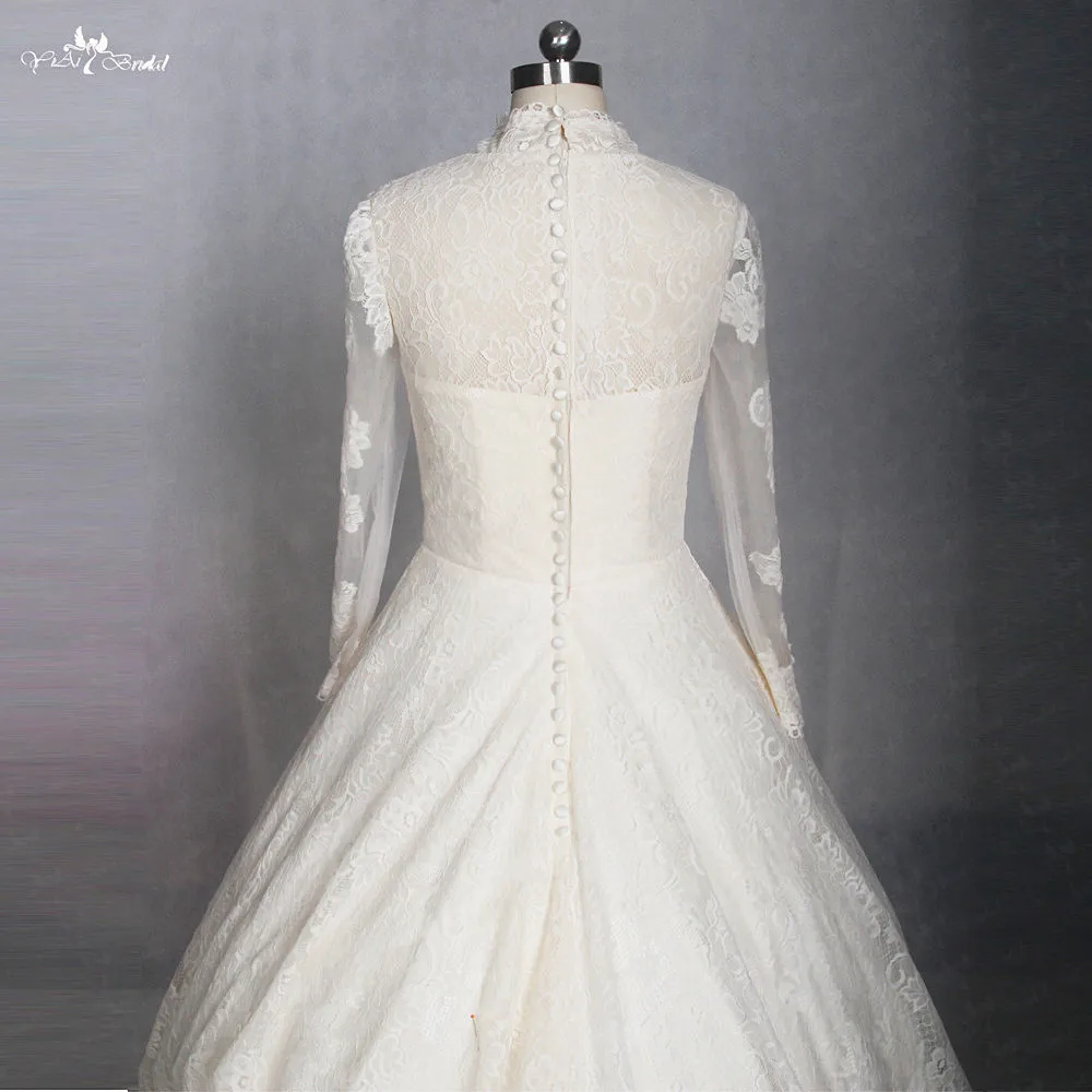 Желтое свадебное платье с длинным рукавом и высоким воротом| |