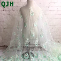 latest 1yard african tulle swiss voile lace fabrics white green peacock feather pattern embroidered skirt cloth dress accessory