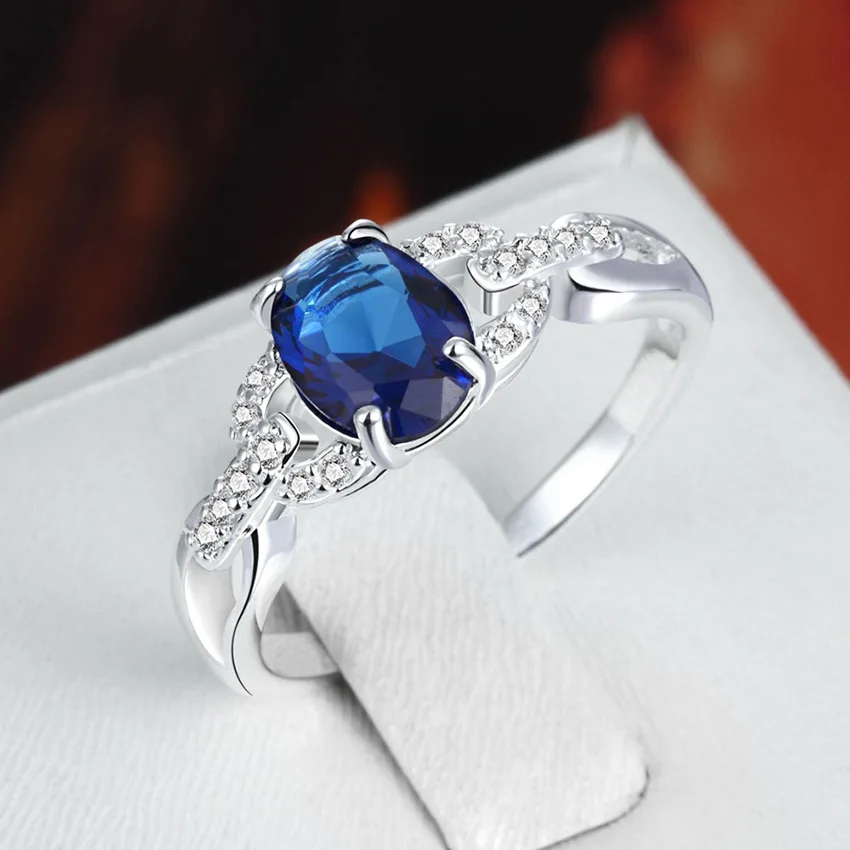 Кольцо Бесконечность с серебряным покрытием и синим цирконием женские недорогие