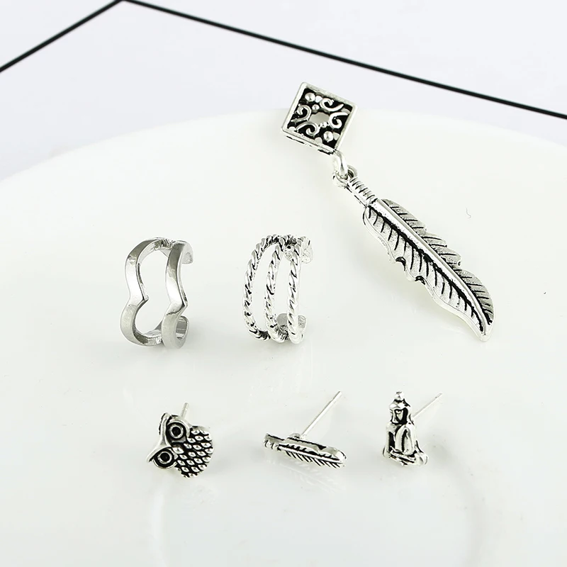 Женские серьги-каффы в стиле панк рок с цепочкой виде листика кисточками