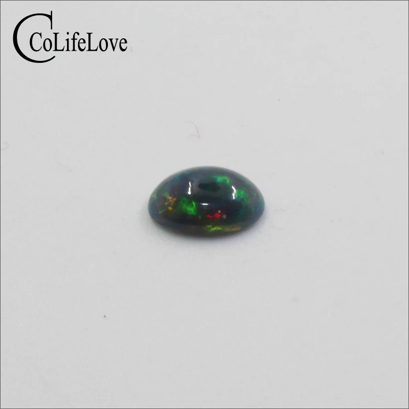 

5mm*7mm natural treated black opal loose gemstone for jewelry making wholesale dyed black opal gemstone