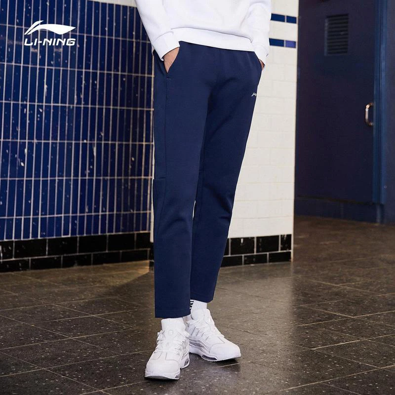 Мужские тренировочные штаны Li-Ning спортивные из 63% полиэстера с подкладкой хлопка