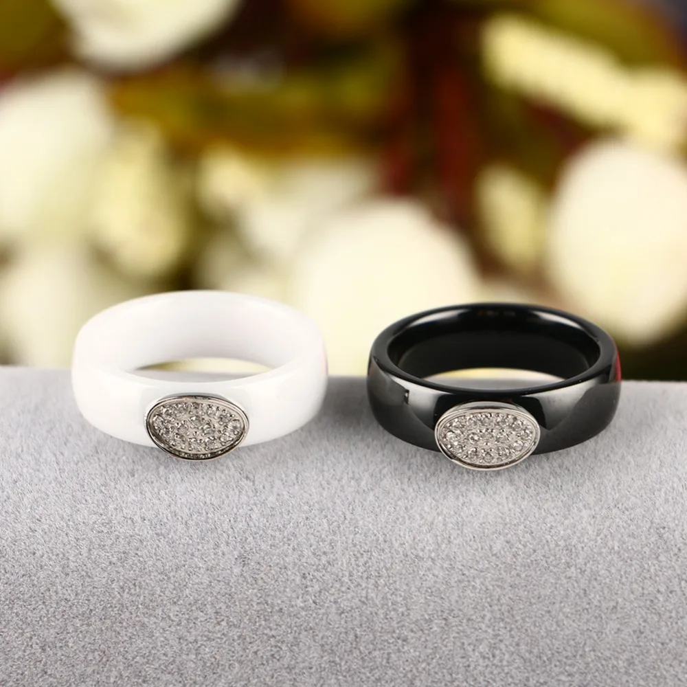 Женские гладкие керамические кольца с овальным стальным кристаллом свадебные