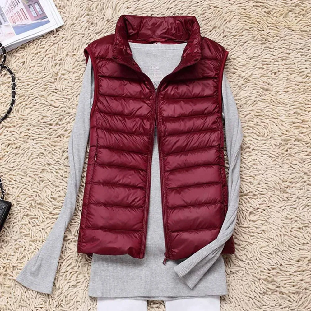 Пуховик женский ультралегкий теплый жилет куртка без рукавов облегающий