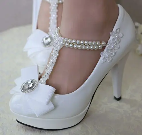 Новейший дизайн Женские белые свадебные туфли с бантом и жемчужным ремешком 100%