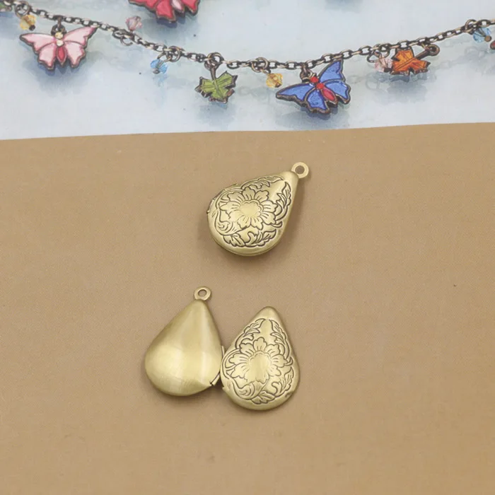 10 PCS 15*24mm Metal Copper Antique Bronze Brushed Water Drop Photo Locket Pendant Charm For Jewelry Making |