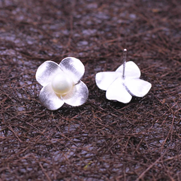 

Silver S925 silver jewelry handmade pearl earrings simple lady clover