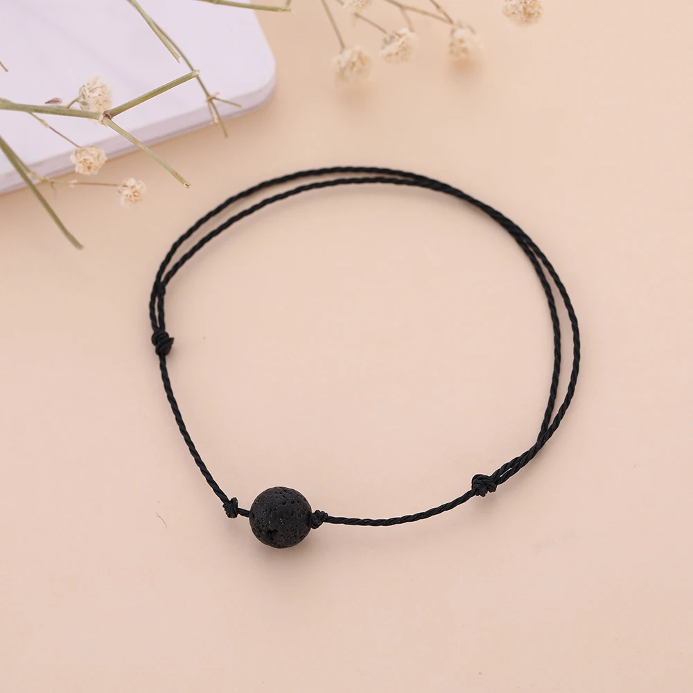 Женский браслет с подвеской в виде воскового шнура регулируемыми бусинами