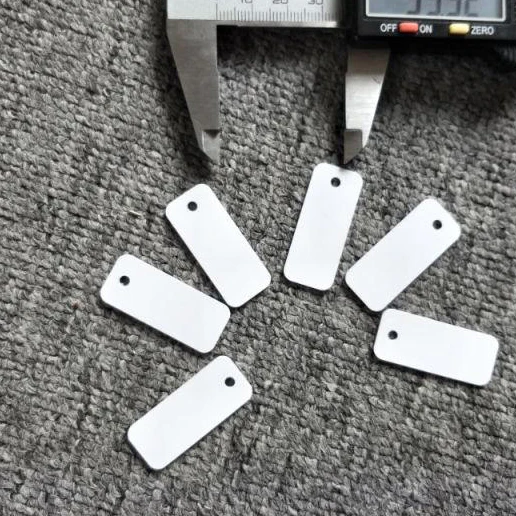 13.56MHz ISO15693 CODE-X PVC cards with holes for clothing management 36*15mm |