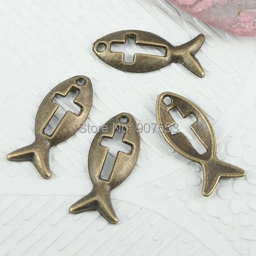 

66pcs antiqued bronze hollow cross pattern on the fish charms EF0887