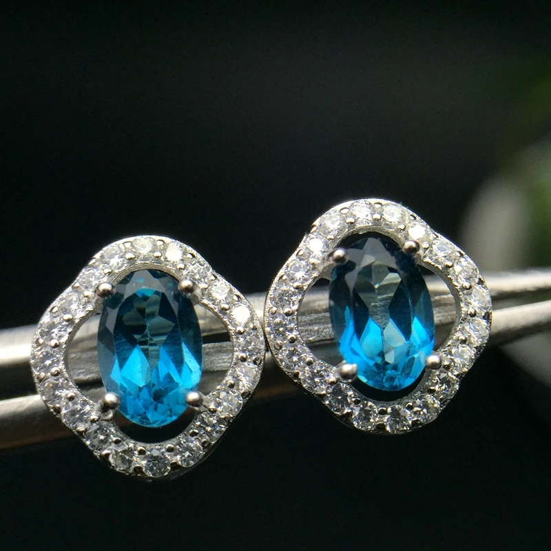 

Almei Natural Blue Topaz Stud Earrings for Women, 925 Sterling Silver,4*6mm*2 Pcs Birthstone Gemstone Wedding Jewelry FR109