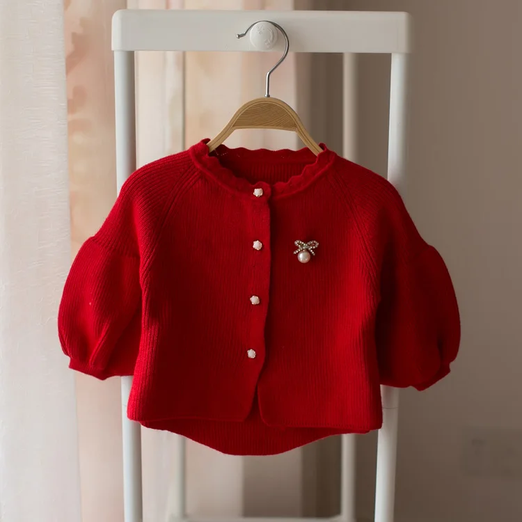 

New baby cardigan in spring and autumn of 2018. the coat of the bubble sleeve.