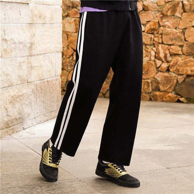 Mark Fairwhale 2019 new arrival men straight pants mid waist drawstring loose side stripe printed knitted trousers 718123011008 |