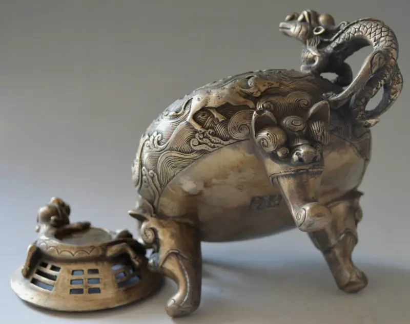

Collectible Decor Miao Silver Carved Dragon Fish Cattle Incense Burner.