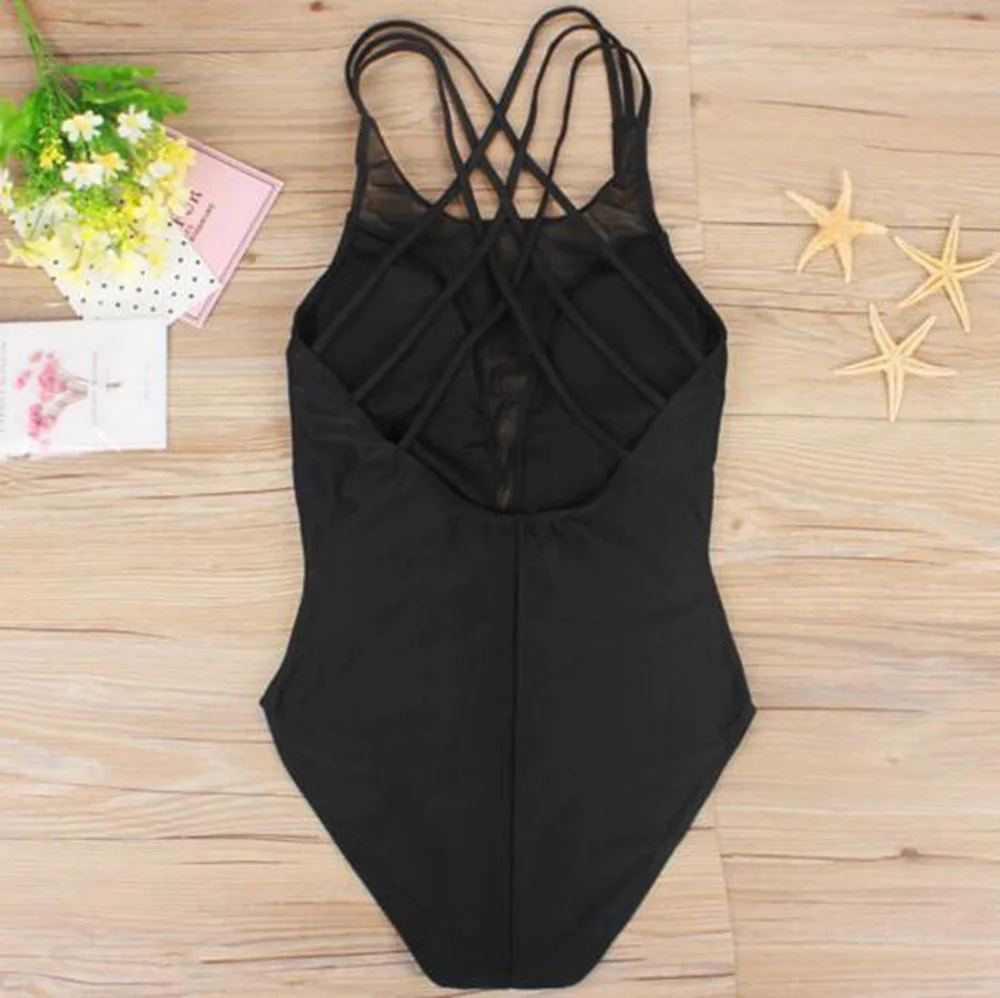 Женский слитный купальник однотонный черный большие размеры сетчатый бандажный