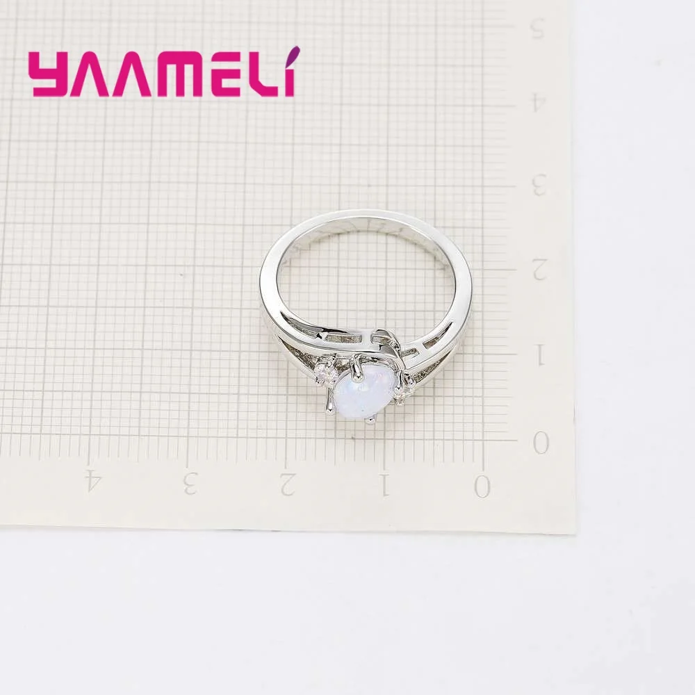 Оригинальные кольца на палец с овальным опалом и блестящим кристаллом из